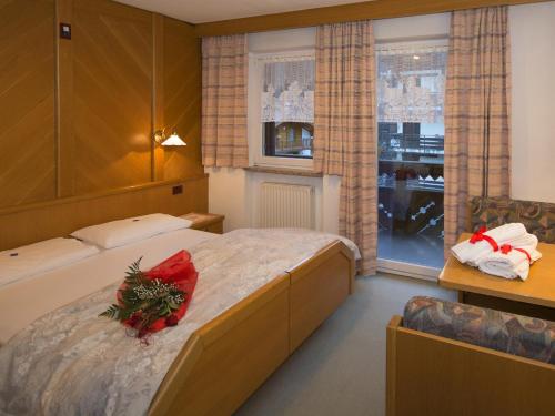 Postel nebo postele na pokoji v ubytování Residence Cirelle Suite & Spa