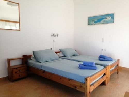 Postel nebo postele na pokoji v ubytování RODON PANDELI APARTMENT in Spilia Leros