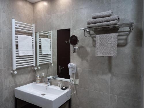 Ένα μπάνιο στο Bakuriani Crystal Loft 406