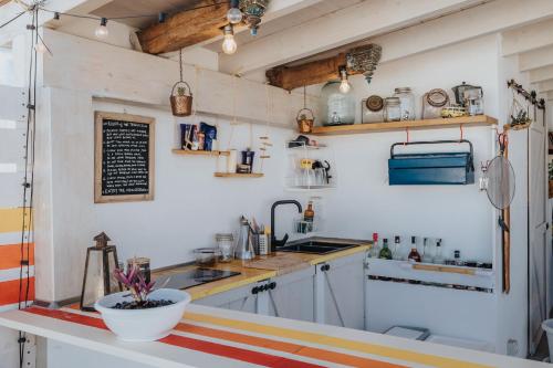 Kuchyň nebo kuchyňský kout v ubytování Casa Allegranza
