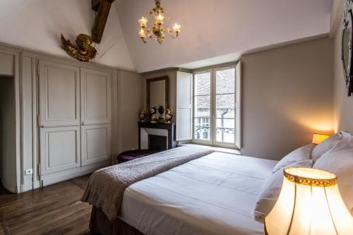 Postel nebo postele na pokoji v ubytování Les Univers de Panette, Un magnifique duplex