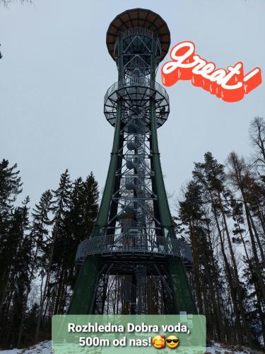 a sign in front of the radio della polina vodka tower at Lipnohaus in Horní Planá