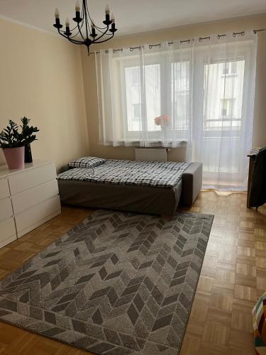 Posteľ alebo postele v izbe v ubytovaní Apartment Kabaty