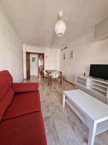 Televízia a/alebo spoločenská miestnosť v ubytovaní Apto 2 hab Playa y Aeropuerto - Martín Carpena