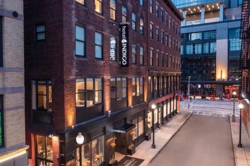 an empty street in front of a building at Hotel Indigo Boston Garden, an IHG Hotel in Boston