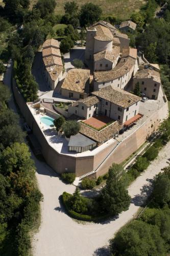 an aerial view of a house with a swimming pool at Casa Oliva borgo del Benessere Olistico in Bargni