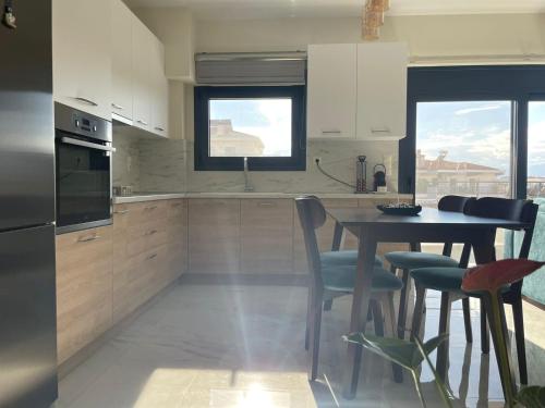 Kuchyň nebo kuchyňský kout v ubytování Finix Loft Trikala