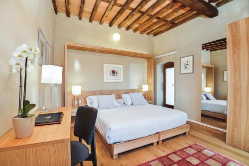 Relais Montepepe Winery & Spaにあるベッド