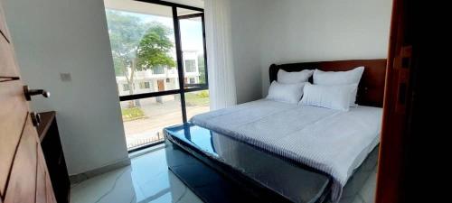 Posteľ alebo postele v izbe v ubytovaní Chichi Luxurious - Gazeel
