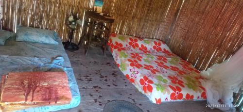 Cama o camas de una habitación en Cabaña Playa Anchive