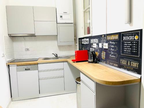 Kuchyň nebo kuchyňský kout v ubytování CenterApartment