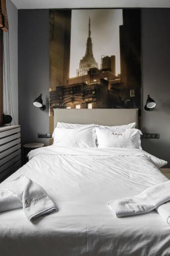 Кровать или кровати в номере 4 Seasons Luxury Apartments