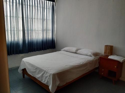 Ένα ή περισσότερα κρεβάτια σε δωμάτιο στο Gera Guest House