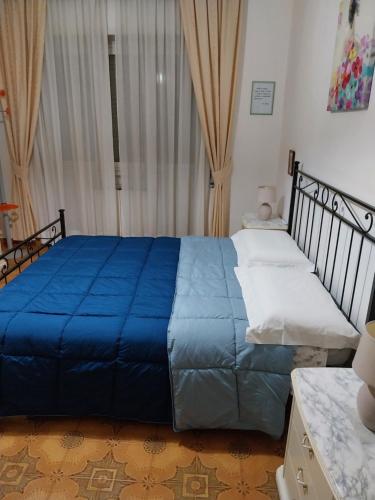 Posteľ alebo postele v izbe v ubytovaní Appartamento del Colle