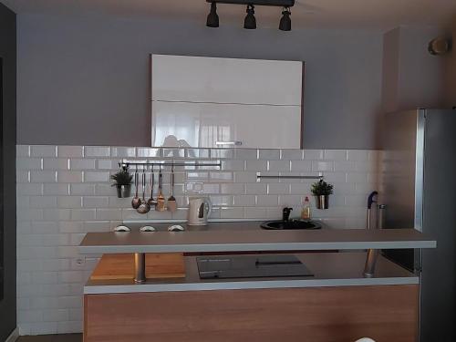 Kuchyň nebo kuchyňský kout v ubytování Apartman Urban & 4