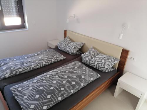 מיטה או מיטות בחדר ב-Bella Mare