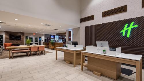 a lobby of a hospital with desks and chairs at Holiday Inn - Clarksville Northeast by IHG in Clarksville