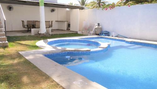 Piscina en o cerca de Casa en playa de san blas