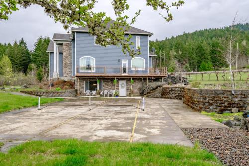 a house with a large driveway in front of it at Red Tail Ridge PNW in Philomath