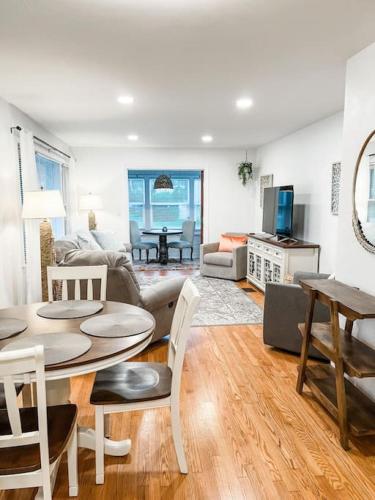 a living room with a table and a couch at Changes In Latittude Retreat in Daytona Beach