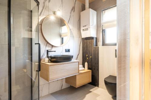 Kúpeľňa v ubytovaní Furmanova Chalets