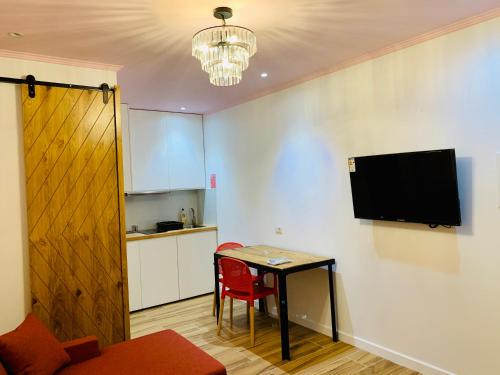 TV a/nebo společenská místnost v ubytování Hard Rock Apartments