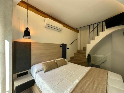 Letto o letti in una camera di La Mini Casa