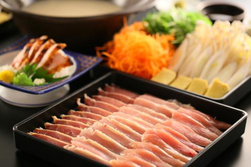 a tray of different types of food with meat and cheese at Shosenkaku in Nagano