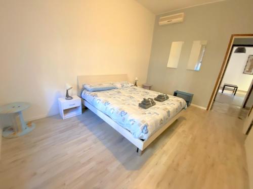 Postel nebo postele na pokoji v ubytování Casa Manolo Corsico Navigli Suite Apartment Milan