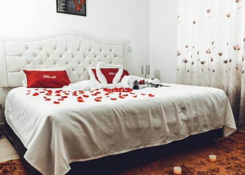 Una cama o camas en una habitación de Hotel Feimar