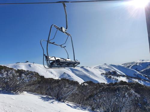 a ski lift over a snow covered mountain at SNOWED INN apartment in Dinner Plain
