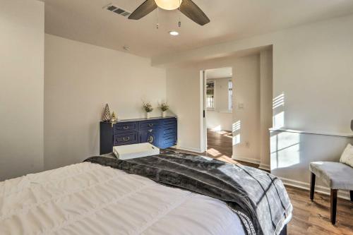 a bedroom with a bed and a ceiling fan at Atlanta-Area Retreat Near Lake Pet Friendly! in Peachtree City