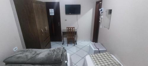 TV a/nebo společenská místnost v ubytování HOTEL Rafael