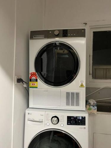 two microwaves are stacked on top of each other at St Albans in St Albans