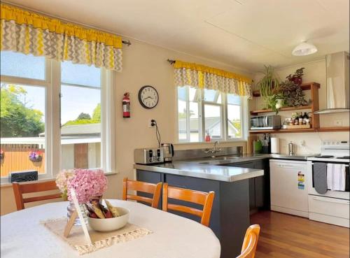 A kitchen or kitchenette at Peaceful House with Kids Playground