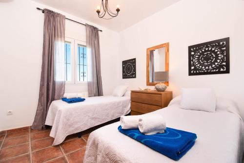 A bed or beds in a room at Familia