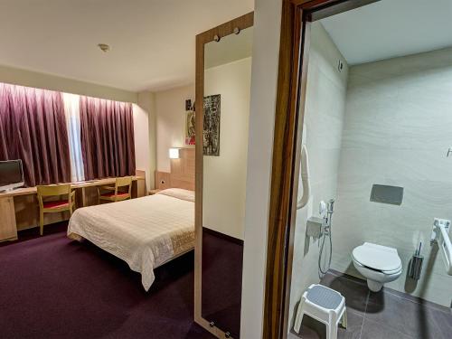 Ванная комната в Hotel Capital