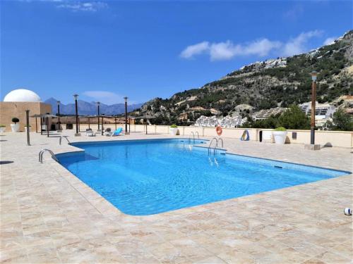 Bazén v ubytování Altea Mascarat playa nebo v jeho okolí
