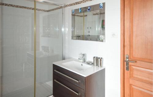 a white bathroom with a sink and a shower at Awesome Home In La Gaude With Kitchen in La Gaude