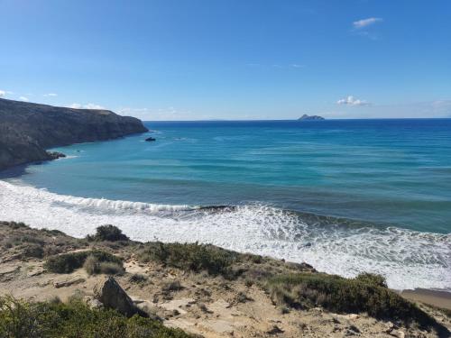 a view of the ocean from a beach at Irini's Home - Pitsidia in Pitsidia