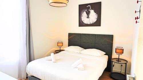 Katil atau katil-katil dalam bilik di Centre Cannes, Appartement 301, 1 room By Palmazur
