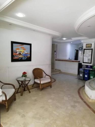 Μια τηλεόραση ή/και κέντρο ψυχαγωγίας στο Apartamento Excalibur 11B junto al mar
