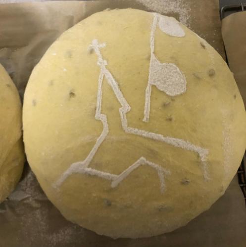 a dough with a drawing of a person on it at L'Escale (accès en télécabine) in Châtel