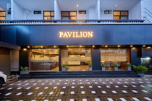 a building with a sign that reads paylation at Nettoor Pavilion in kumbalam