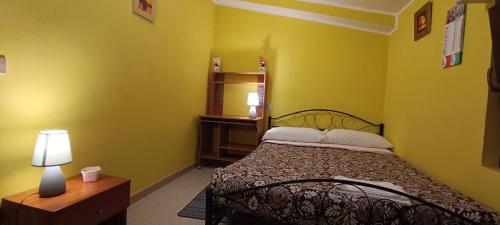 Katil atau katil-katil dalam bilik di Complesso turistico Aurora - camere B&B