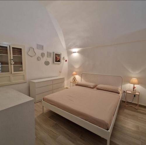 Un pat sau paturi într-o cameră la Solis Domus - Aurora