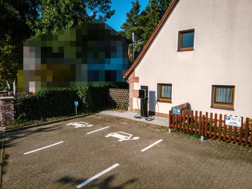 a parking lot in front of a building at Übernachten in der Tenne in Nürnberg