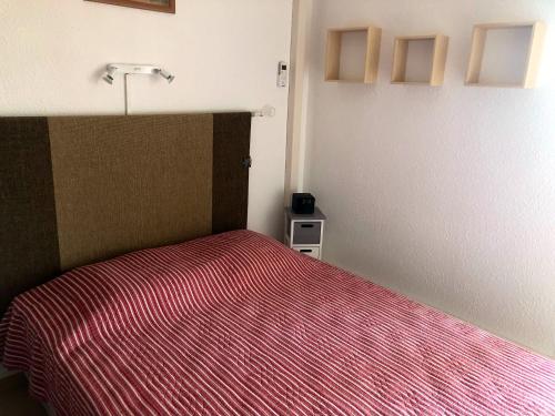 Ένα ή περισσότερα κρεβάτια σε δωμάτιο στο Appartement cosy à Argelès-sur-Mer 30 m² avec piscine partagée