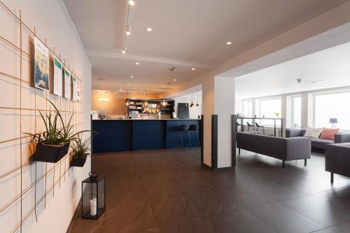 an open living room and kitchen in a building at The View in Honningsvåg