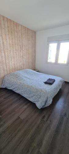 Letto o letti in una camera di Charmante maison pérolienne